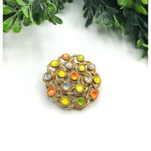 Vintage Brooch gold tones with multi color gems Sara Covington